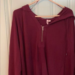 Pull over sweater with a zipper.